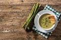 Fresh asparagus soup in bowl.Copy space Royalty Free Stock Photo