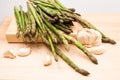 Fresh asparagus stems and garlic Royalty Free Stock Photo