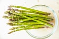 Fresh asparagus in a transparent bowl Royalty Free Stock Photo