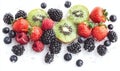 Fresh assorted berries and kiwi fruit with water splash isolated on white background Royalty Free Stock Photo