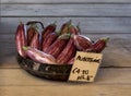 Fresh aubergines in the basket. Purple maltese aubergines in the street market. Organic vegetables. Fragment photo of organic mark Royalty Free Stock Photo