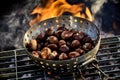 Fresh autumn chestnuts roasting over a fire Royalty Free Stock Photo