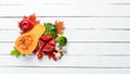 Fresh autumn vegetables and fruits on white wooden background. Healthy food. Top view. Royalty Free Stock Photo