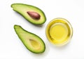 Fresh avocado and oil on white Royalty Free Stock Photo