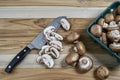Slicing Mushrooms on the counter Royalty Free Stock Photo