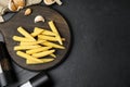 Fresh baby corn cobs served on black table, flat lay. Space for text Royalty Free Stock Photo