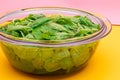 Fresh Baby Spinach Leaves in the Water in Glass Bowl Royalty Free Stock Photo