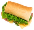 Fresh baguette sandwich with ham, cheese, tomatoes, and lettuce Royalty Free Stock Photo