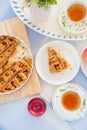 Fresh baked apple pie, cup of tea and flowers on a table Royalty Free Stock Photo