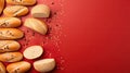 Golden loaves and bread slices scattered with sesame seeds on a rich red background.