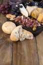 Fresh baked bread. Different snack for wine. Cheese and olives. copy space Royalty Free Stock Photo