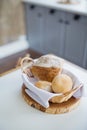 Fresh baked bread and loafs in a wicker basket Royalty Free Stock Photo