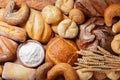 Fresh baked bread and wheat ears, top view Royalty Free Stock Photo