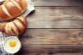 Fresh Baked Breads with Egg Yolk on Rustic Wood Table, Rustic Food Style Royalty Free Stock Photo