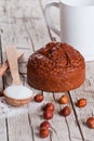 Fresh baked browny cake, milk, sugar, hazelnuts Royalty Free Stock Photo