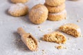 Fresh baked butter cookies with peanut sprinkled with powdered sugar. Light grey stone background. Royalty Free Stock Photo