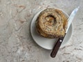 Fresh-baked cardamom roll for breakfast at a cafe.