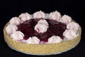 Fresh baked cherry pie with whipped cream decorations on top Royalty Free Stock Photo