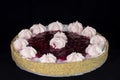 Fresh baked cherry pie with whipped cream decorations on top Royalty Free Stock Photo