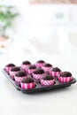 Fresh Baked Chocolate Cupcakes in Pink Wrappers Royalty Free Stock Photo