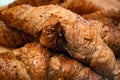 Fresh baked croissants with chocolate and seeds Royalty Free Stock Photo