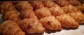 Fresh Baked Croissants. Warm Fresh Buttery Croissants and Rolls. French and American Croissants and Baked Pastries Royalty Free Stock Photo