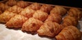 Fresh Baked Croissants. Warm Fresh Buttery Croissants and Rolls. French and American Croissants and Baked Pastries Royalty Free Stock Photo