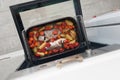 Fresh Baked fish with vegetables and potatoes in pan Royalty Free Stock Photo