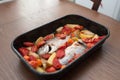 Fresh Baked fish with vegetables and potatoes in pan Royalty Free Stock Photo