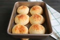 Fresh baked homemade Brazilian cheese bread or Pao de Queijo in the baking tray Royalty Free Stock Photo