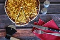 Delicious fresh baked homemade chicken pizza with cheese, pizza slice on rustic wooden table.. Royalty Free Stock Photo