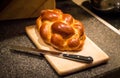 Loaf of challah bread with a knife Royalty Free Stock Photo