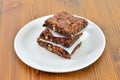 Nutty fudge brownie cake on wooden table