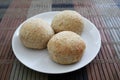 Fresh baked pandesal on a white plate. Royalty Free Stock Photo