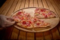 Fresh Baked Pizza on Wooden table Royalty Free Stock Photo