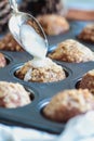 Fresh Baked Pumpkin Muffins in Baking Pan with Icing Royalty Free Stock Photo