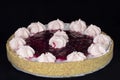 Fresh baked raspberry pie with whipped cream decorations on top Royalty Free Stock Photo