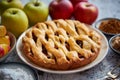 Fresh baked tasty homemade apple pie cake with ingredients on side Royalty Free Stock Photo