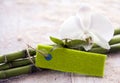 Fresh bamboo with an orchid and blank tag Royalty Free Stock Photo