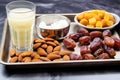 fresh bananas, dates, and water on a tray Royalty Free Stock Photo