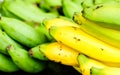 Fresh bananas on wooden background in the fruit market,Healthy food, bananas rich in vitamins, healthy lifestyle and prevention of