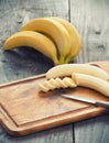 Fresh bananas on wooden background Royalty Free Stock Photo