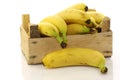 Fresh bananas in a wooden crate