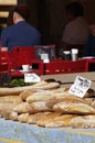 Fresh batard bread and baguettes for sale in open market in Sarlat France