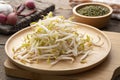 Fresh beansprout on wooden plate Royalty Free Stock Photo