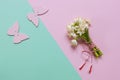 Fresh beautiful bouquet of the first spring forest snowdrops with a red and white martisor cord and a butterfly figure - a Royalty Free Stock Photo