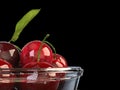 Fresh beautiful cherries in a glass bowl - extreme closeup shot