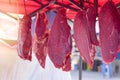 Fresh beef hanging on an iron for sale Royalty Free Stock Photo