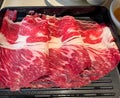 fresh beef raw sliced with marbled texture served for Sukiyaki and Shabu or Yakiniku Royalty Free Stock Photo