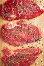 Fresh beef steak and spicel on cutting board Royalty Free Stock Photo